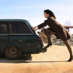 1287589_girl_pushes_the_car_taken_on_credit[1]